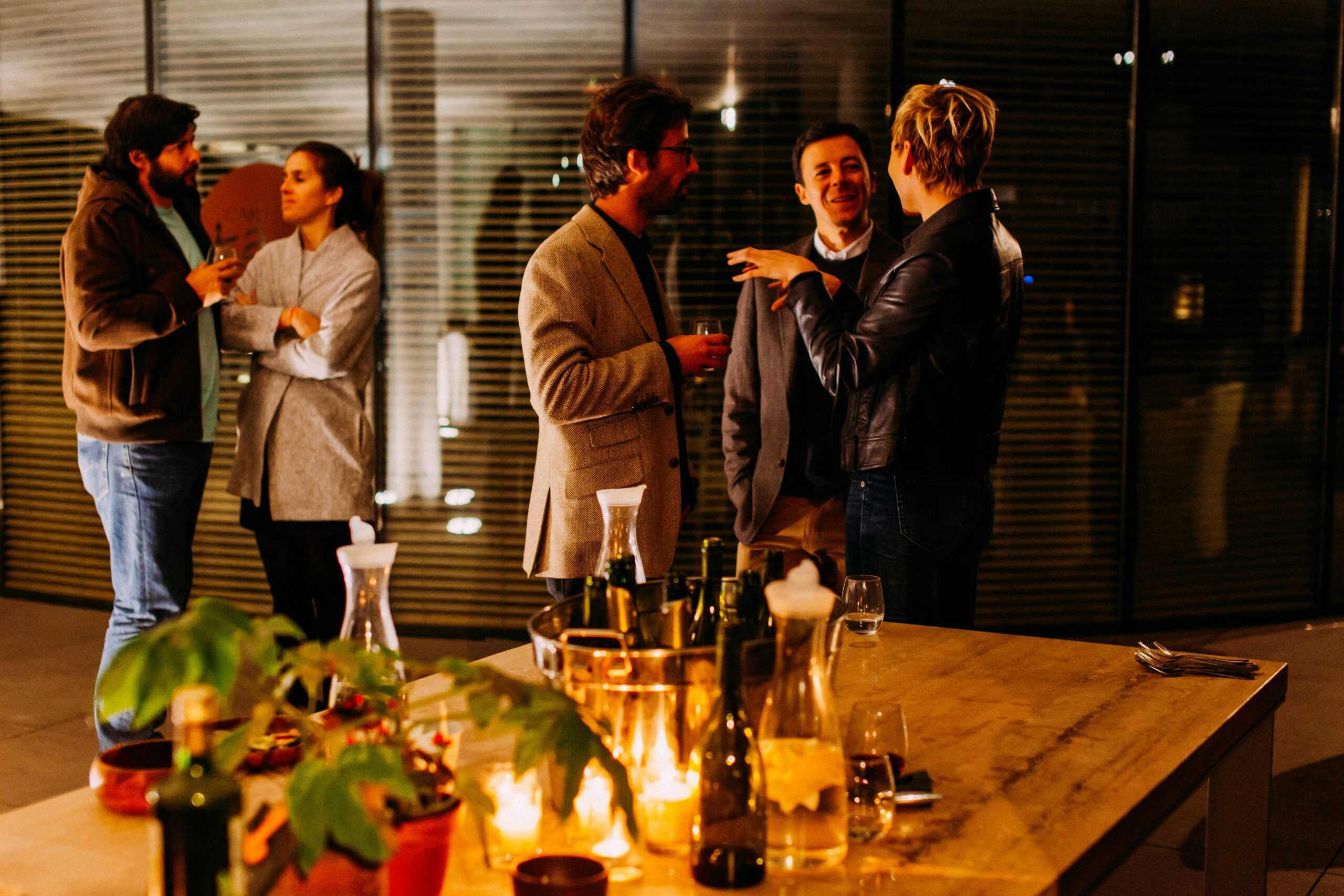 A group of people talking at an event